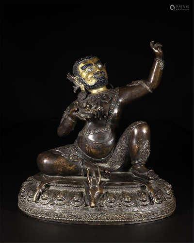 TIBETAN PARTLY GILT BRONZE SEATED MAHASIDDHAS