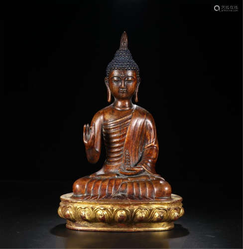 CHINESE AGALWOOD SEATED BUDDHA ON GOLD PAINTED BASE