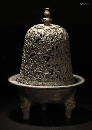 A BRONZE CASTED HOLLOW PATTERN CENSER