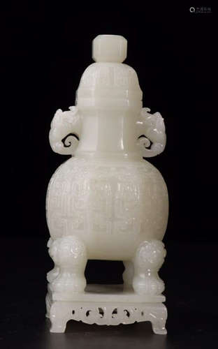 A HETIAN JADE CARVED BEAST PATTERN VASE