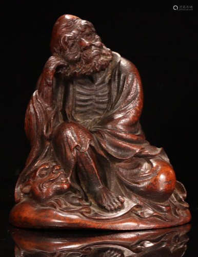 A BAMBOO CARVED LUOHAN BUDDHA