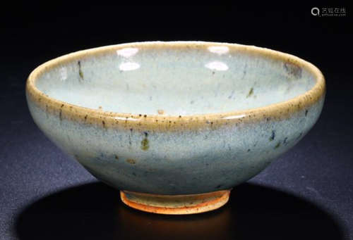 A WHITE GLAZE TEA CUP