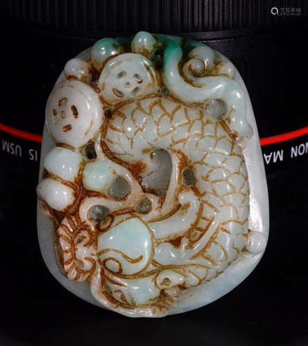 A JADEITE CARVED DRAGON PATTERN PENDANT