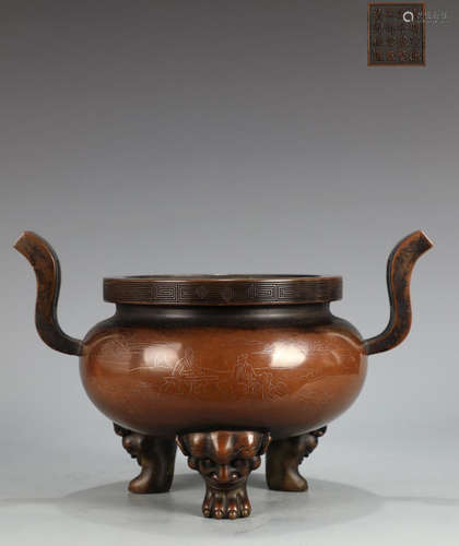 A BRONZE CASTED DOUBLE EAR TRIPOD CENSER