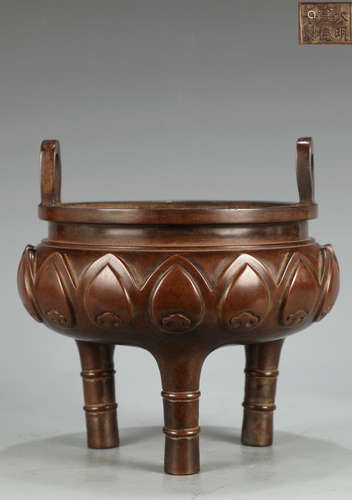 A GILT BRONZE CASTED LOTUS PATTERN TRIPOD CENSER