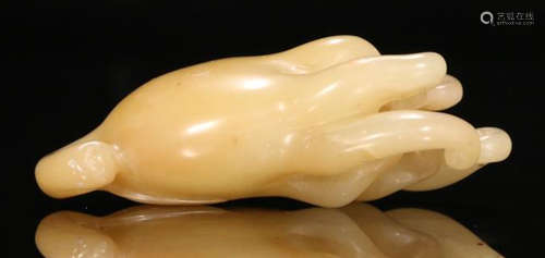 A FURONG SOAPSTONE CARVED CHAYOTE SHAPED PENDANT