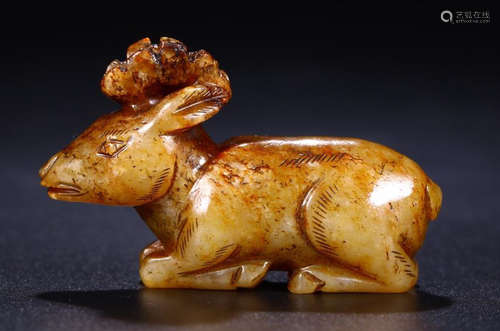 A HETIAN JADE CARVED DEER SHAPED PENDANT