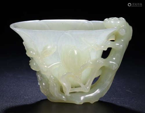 A HETIAN JADE CARVED FLOWER PATTERN CUP