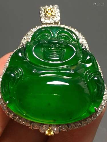 A GREEN JADEITE CARVED BUDDHA PENDANT, TYPE A