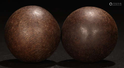 PAIR CHENXIANG WOOD CARVED BALL