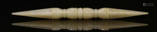 A HETIAN JADE CARVED BUDDHISTIC PENDANT