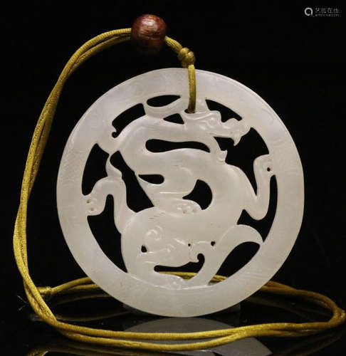 A HETIAN JADE CARVED DRAGON PATTERN PENDANT