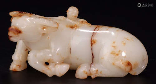 A HETIAN JADE CARVED COW SHAPED PENDANT