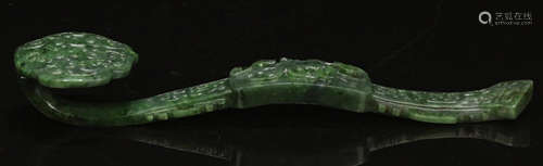 A HETIAN GREEN JADE CARVED RUYI