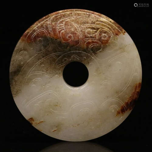 A HETIAN JADE CARVED AUSPICIOUS PATTERN BI