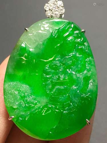 A GREEN JADEITE CARVED LANDSCAPE PENDANT, TYPE A