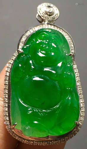 A GREEN JADEITE CARVED BUDDHA PENDANT, TYPE A