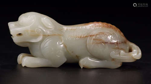 A HETIAN JADE CARVED BEAST SHAPED PENDANT