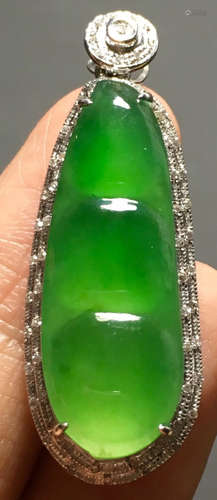 A GREEN JADEITE CARVED BEANS PENDANT, TYPE A