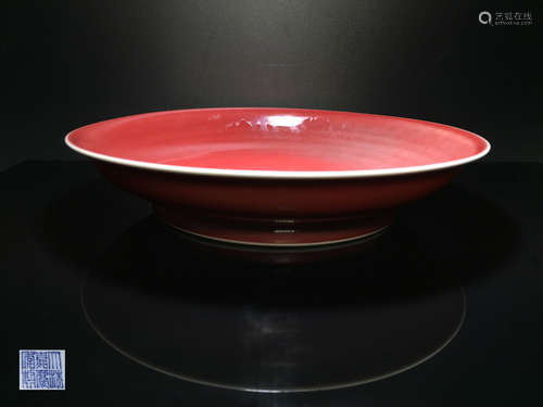 A JIAQING MARK RED-GLAZED PLATE