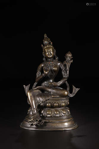 A COPPER TARA BUDDHA STATUE