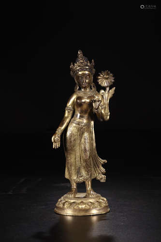 A COPPER GILT BUDDHA STATUE