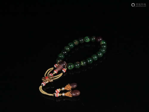 A JADEITE BRACELET OF 18 BEADS