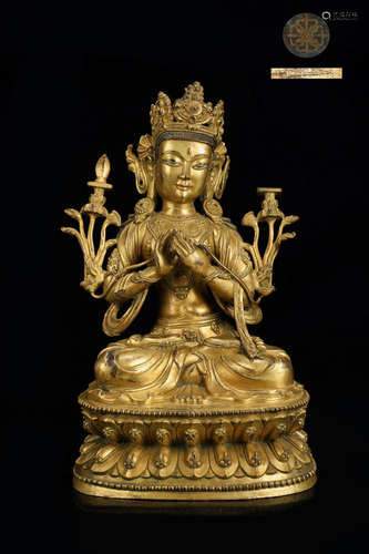 A GILT BRONZE BUDDHA