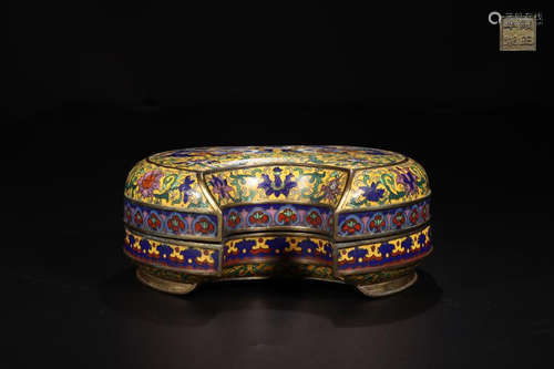 A CLOISONNE BOX CARVED IN BLOSSOMS