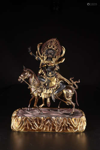 A COPPER GILT PALDEN LHAMO BUDDHA STATUE