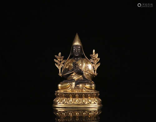 A GILT BRONZE BUDDHA