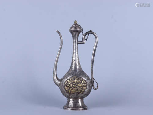 A SILVER POT WITH GILTNG SILVER