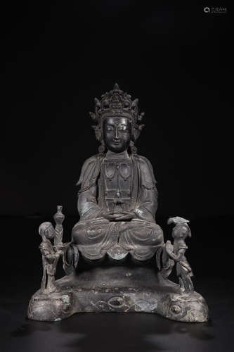 A COPPER GUANYIN STATUE