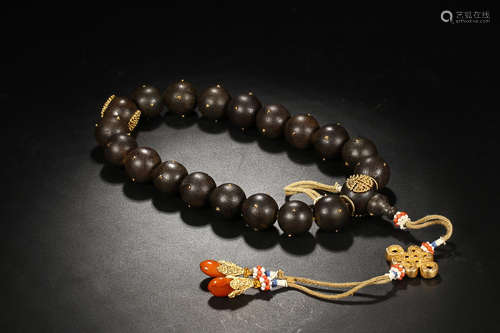 A CHENXIANG WOOD EIGHTEEN BEADS ROSARY