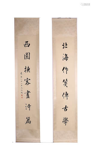 A 'SHENWEI' COUPLET VERTICAL AXIS PAINTING