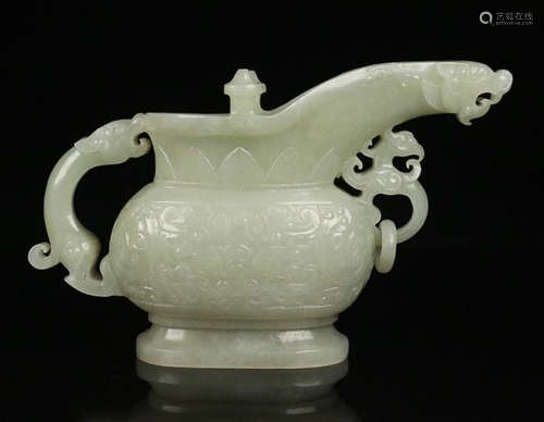 A HETIAN JADE DRAGON-HEAD SHAPED CUP WITH BEAST 'S FACE PATTERN