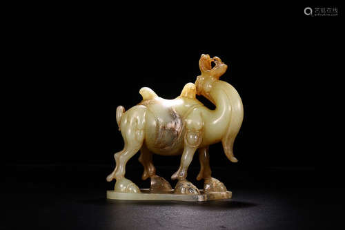 A HETIAN JADE CAMEL SHAPED ORNAMENT