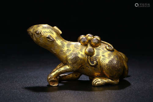 A GILT BRONZE SQUIRREL WITH GRAPES SHAPED PAPER WEIGHT