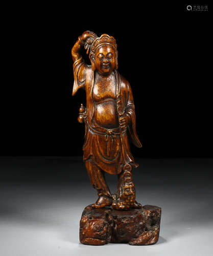 A HUANGYANG WOOD CARVED CHARACTER FIGURE