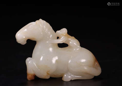 A HETIAN JADE 'MASHANGFENGHOU' ORNAMENT