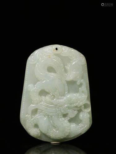 A JADEITE TABLET OF DRAGON CARVING