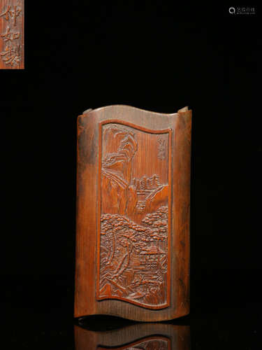 A BAMBOO ARMREST WITH LANDSCAPE CARVING WITH MARKING