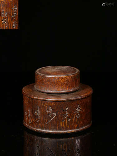 A BAMBOO TEA JAR WITH MARKING