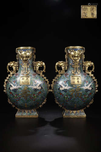 A PAIR OF CLOISONNE VASES CARVED IN CRANES WITH QIANLONGYUZHI MARK