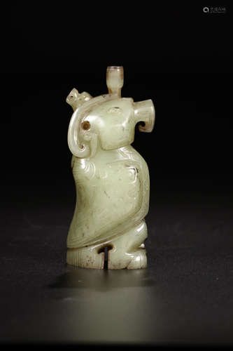 A HETIAN JADE BEAST SHAPED ORNAMENT