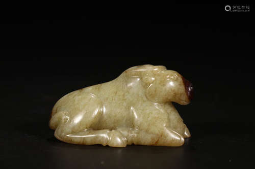 A HETIAN JADE OX SHAPED ORNAMENT