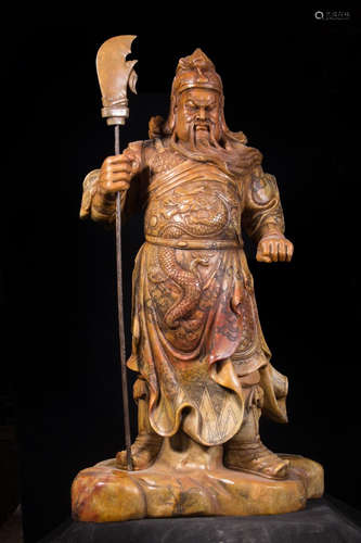 A SHOUSHAN STONE GUANYU SHAPED STATUE