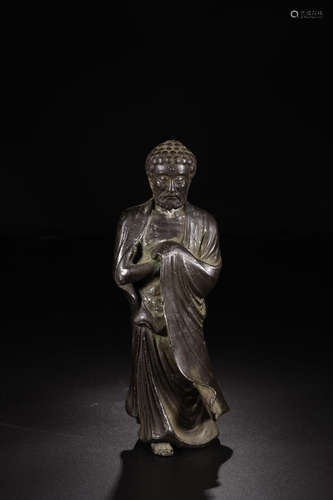 A COPPER BUDDHA STATUE