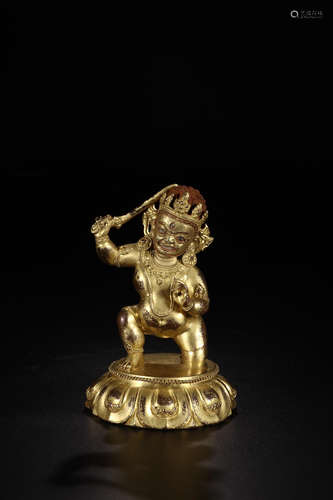 A COPPER GILDED ACALA BUDDHA STATUE