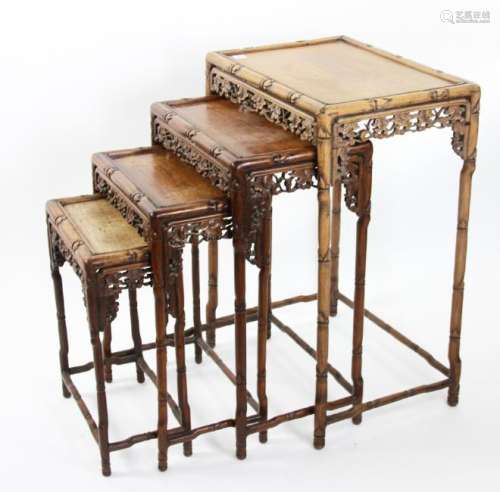 Set of Four Chinese Carved Nesting Tables